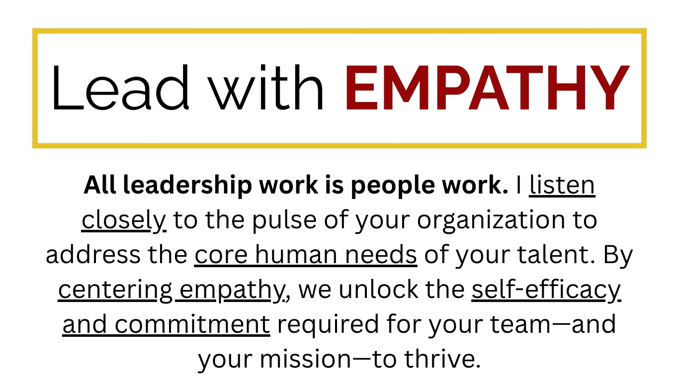 A sign with the words 'Love', 'Empathy', and 'Kindness' in large black and red letters, with additional smaller text promoting positivity and compassion.