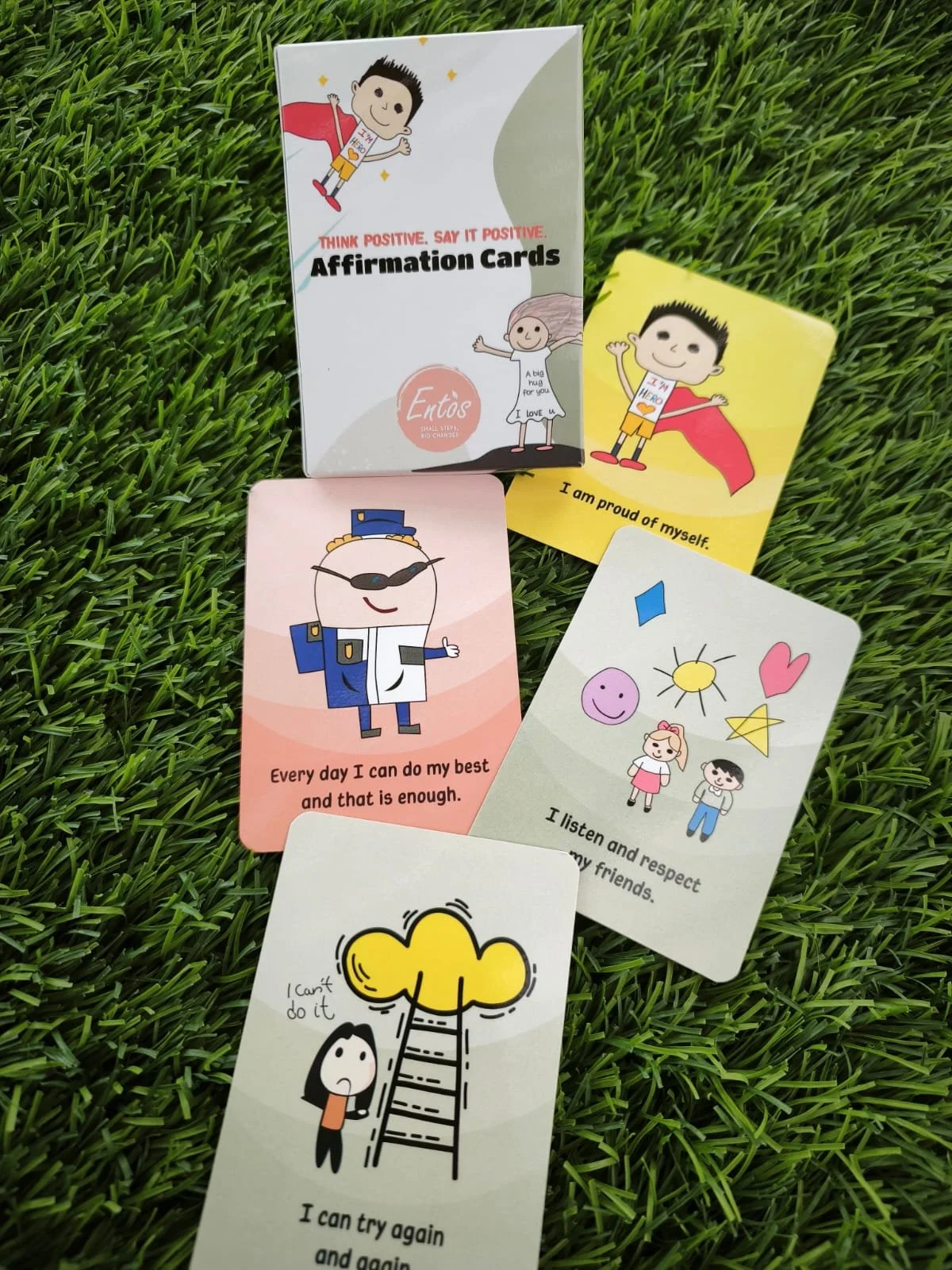 Cards on grass 3_EN.jpeg