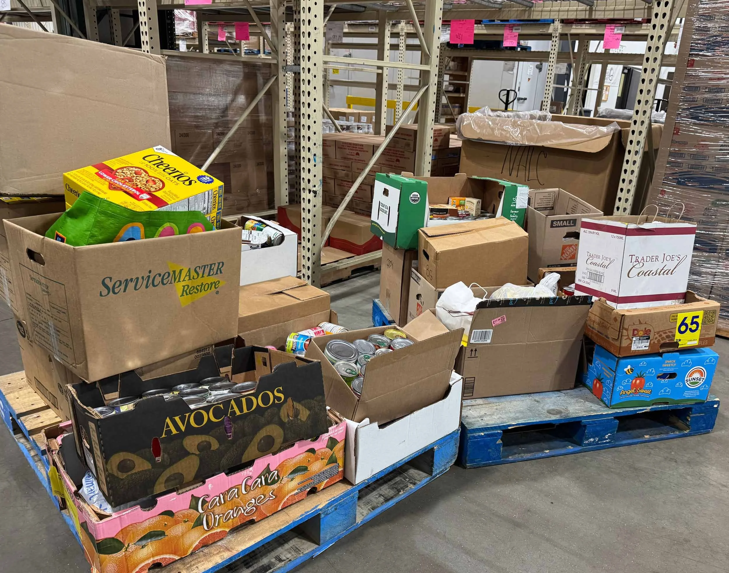 Warehouse with boxes of collected food donations for mutual aid.
