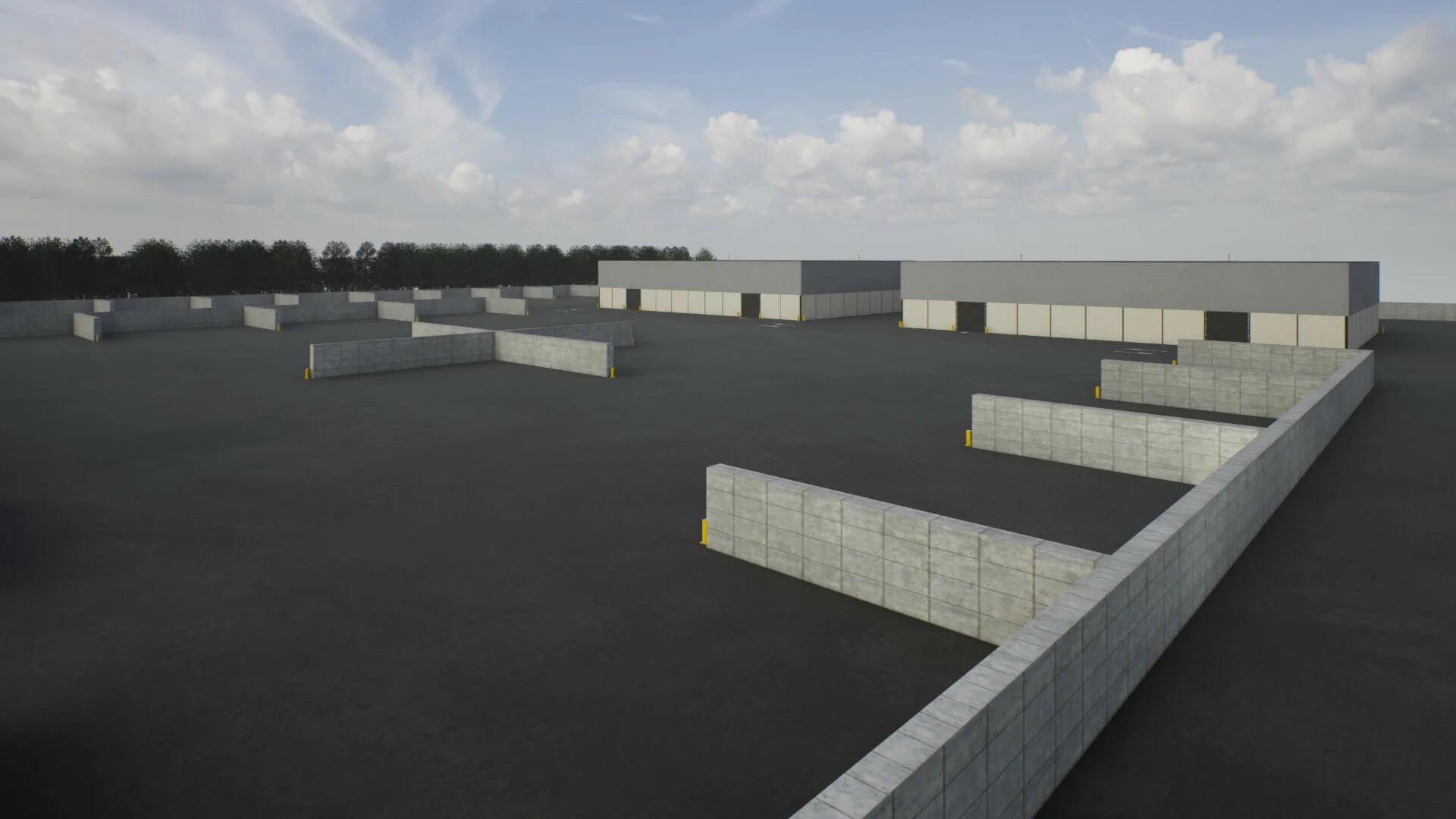 Een grote open ruimte met een asfaltoppervlak, omgeven door betonnen muren en enkele grote gebouwen op de achtergrond, onder een bewolkte lucht.