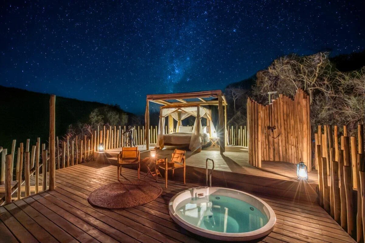 Bianca Bujan sleeps in an open-air star bed in Samburu, Kenya.