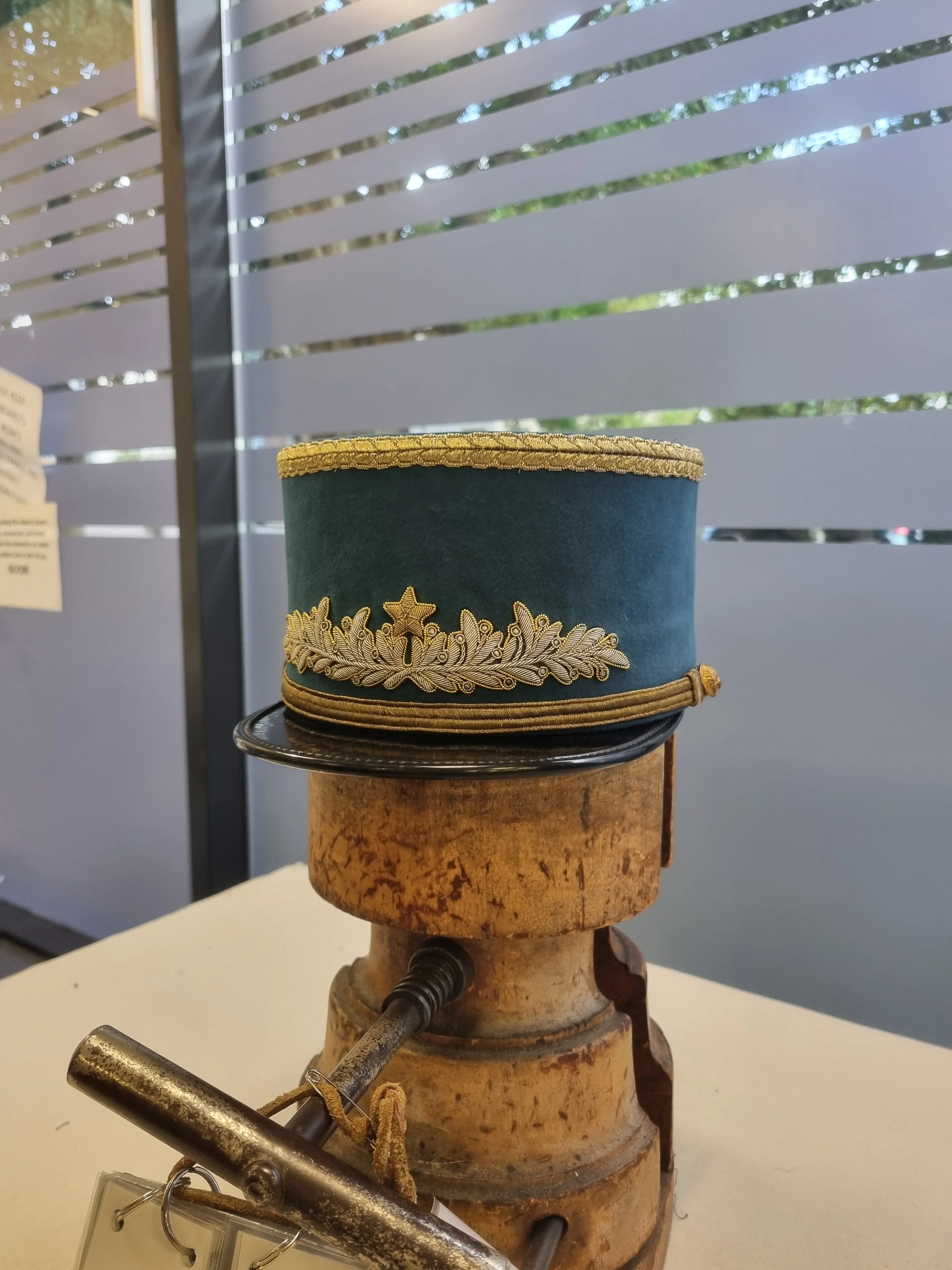 Police Kepi made to likeness of costume of Sacha Baron Cohen in Hugo for Sandy Powell Exhibition, 2024