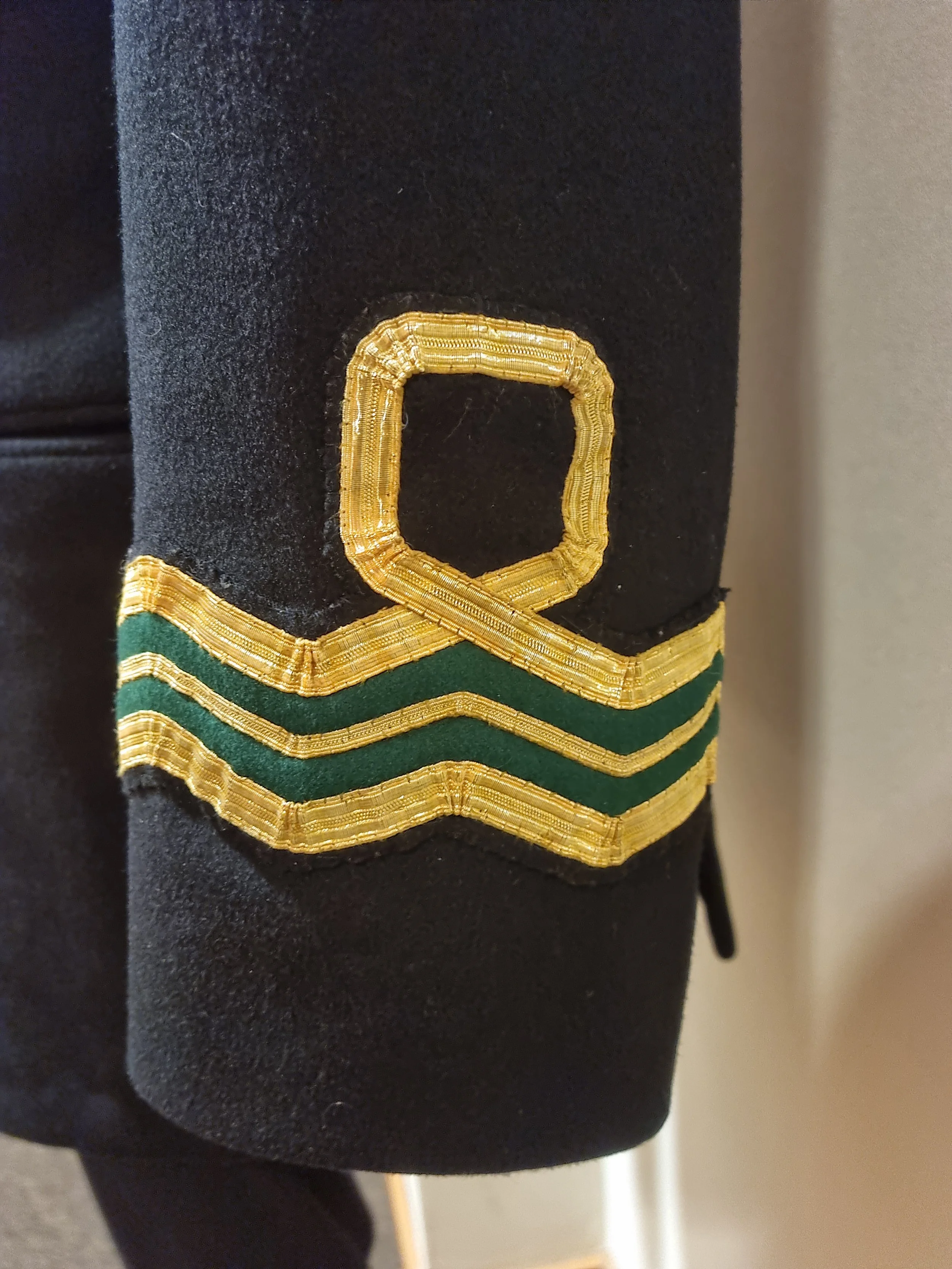 Royal Naval Reserve Intelligence cuff ranking for Colin Firth in Operation Mincement, 2021