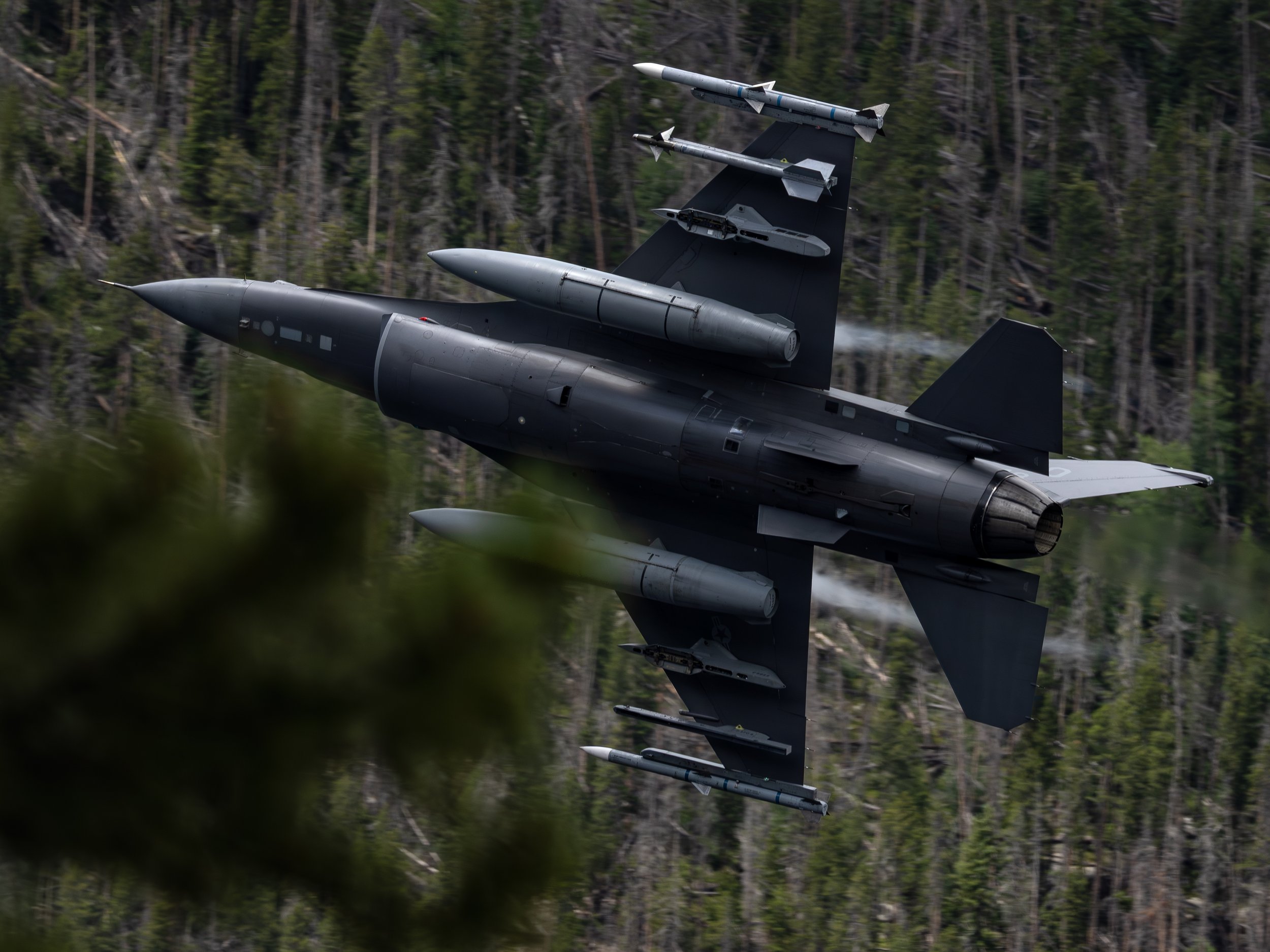 Colorado Air National Guard F-16 C+ Fighting Falcon flying in the mountains of Colorado.