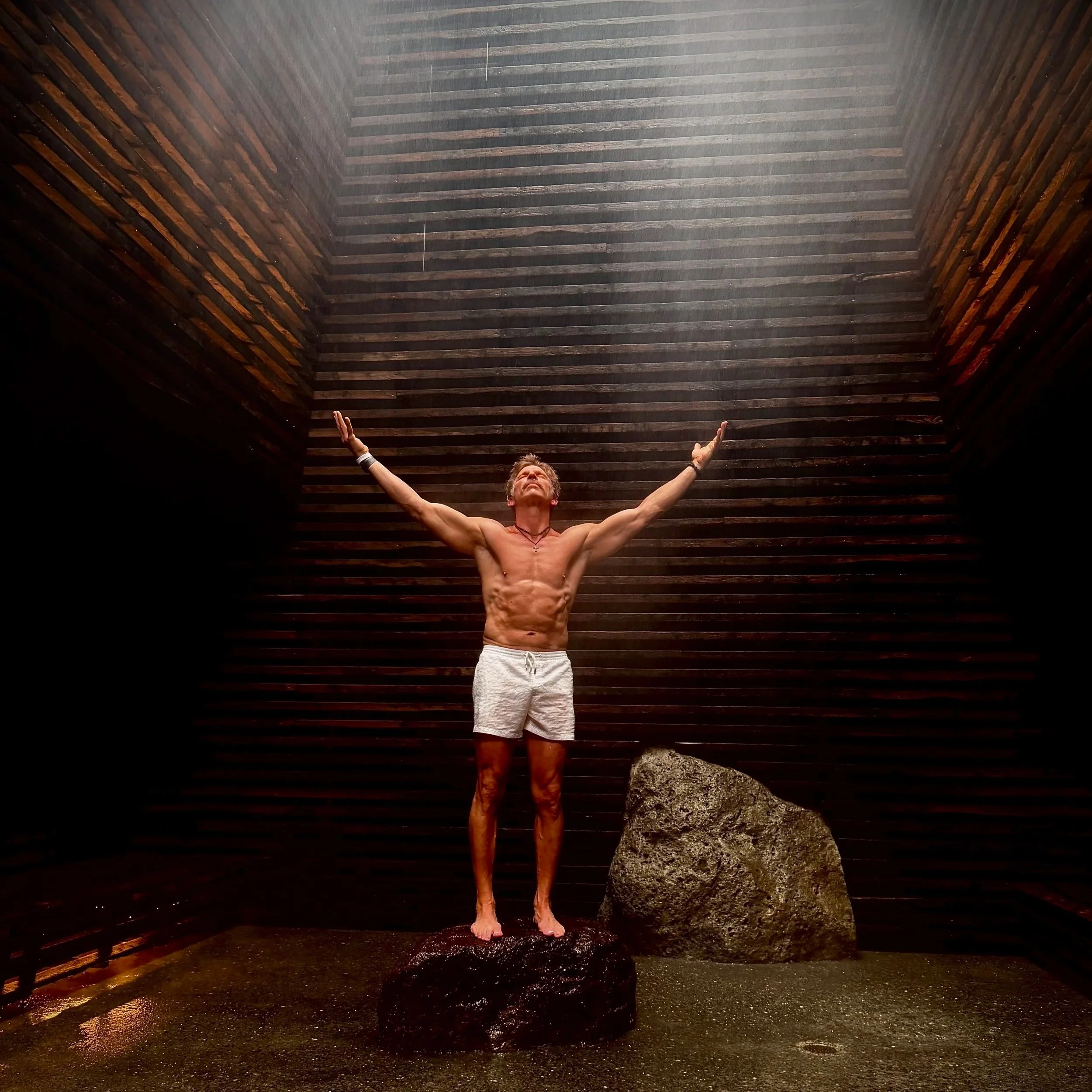 Photo of James Reeman shirtless on a layover.