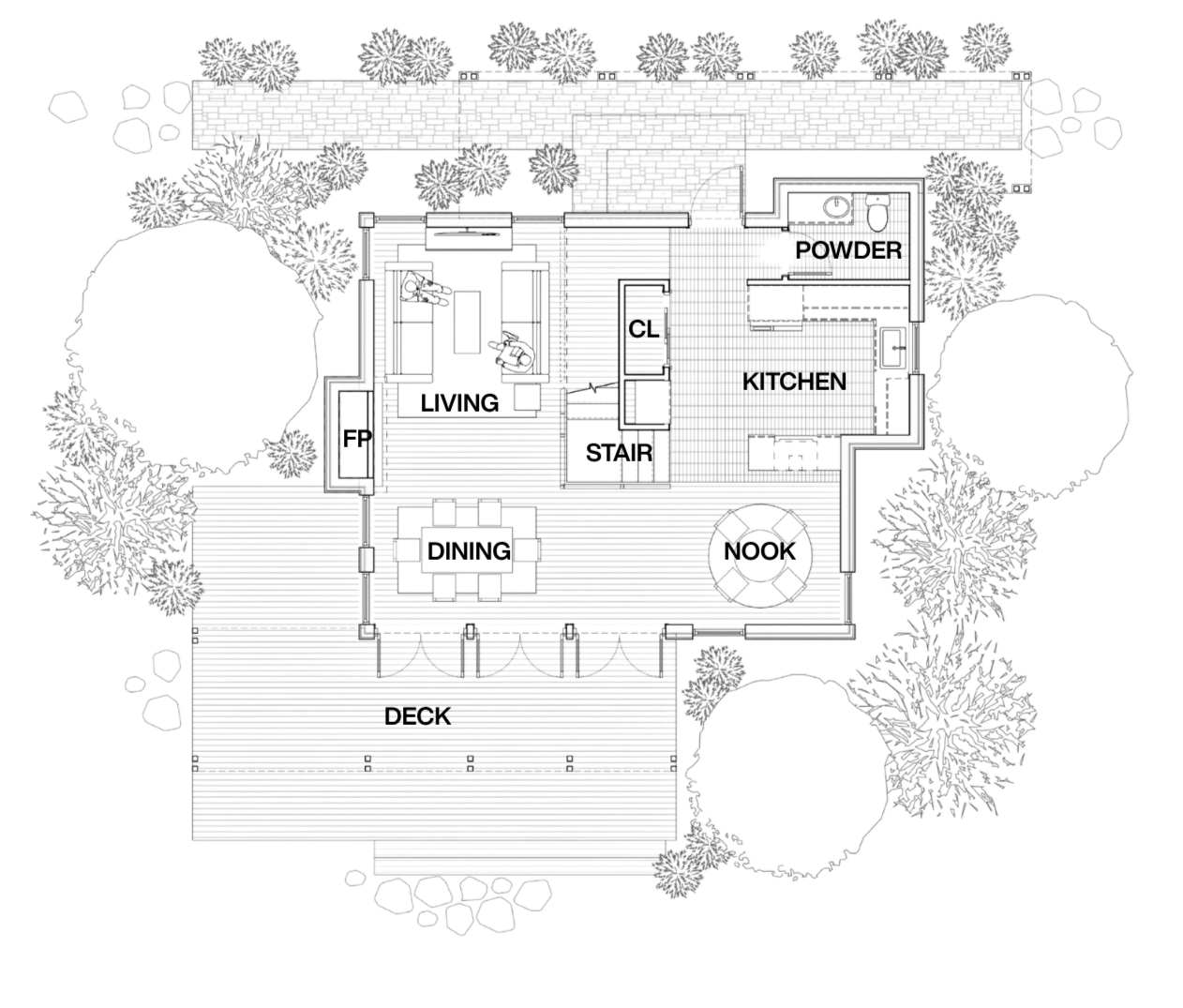 Top view of a house plan showing a deck, kitchen, powder room, living area, and surrounding trees.