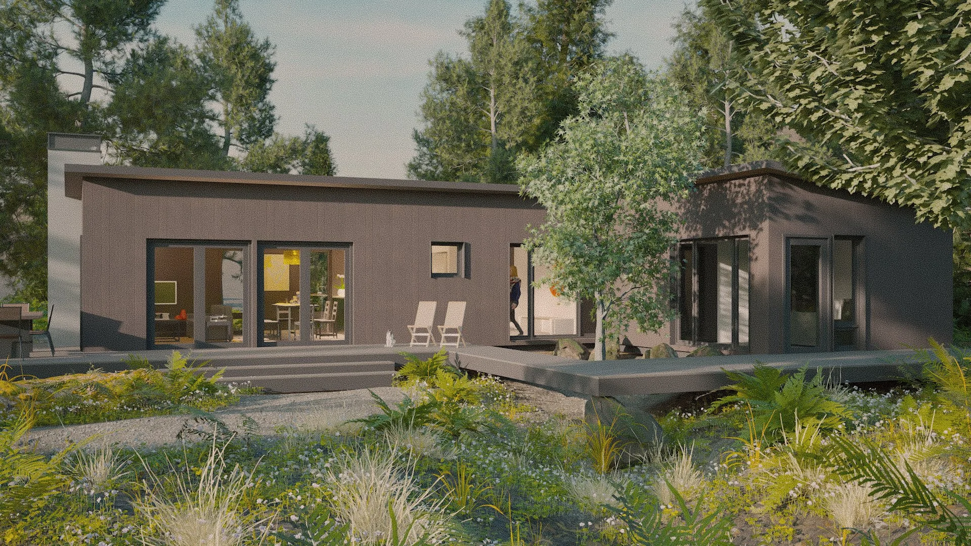 Contemporary house with large glass doors and windows, surrounded by green trees and plants, with a wooden deck in the foreground.