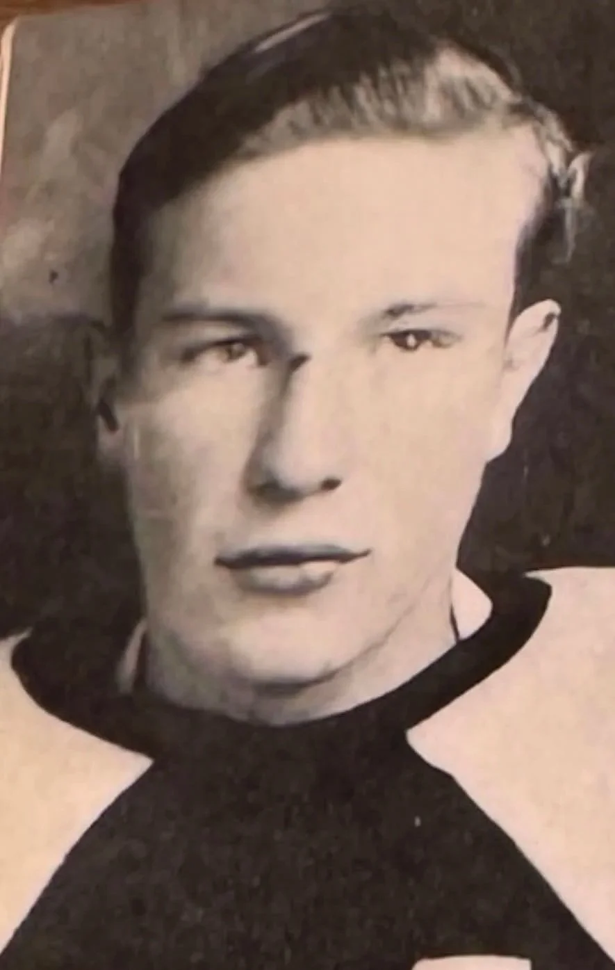 Bob Burns played football and basketball for the Sioux City Central High School "Little Maroons." This yearbook photo shows the results of playing football with no facemask in the 1930s. 