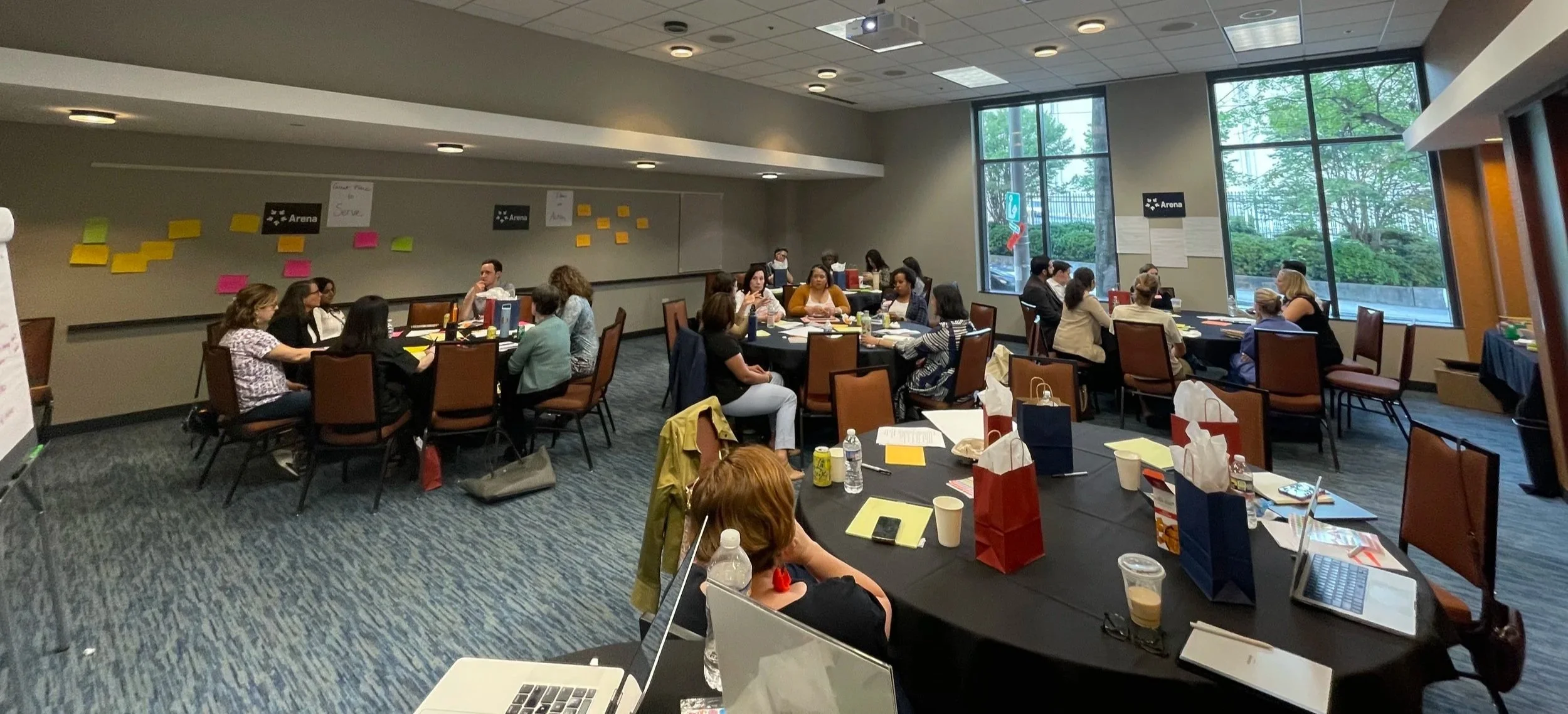 Nonprofit workshop or organizational meeting in Nevada – community-focused session with attendees at round tables facilitated by ALIGN Agency