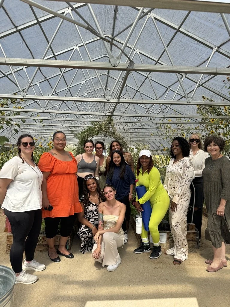 Women-led wellness and community workshop in Nevada – diverse participants engaging in greenhouse activities facilitated by ALIGN Agency