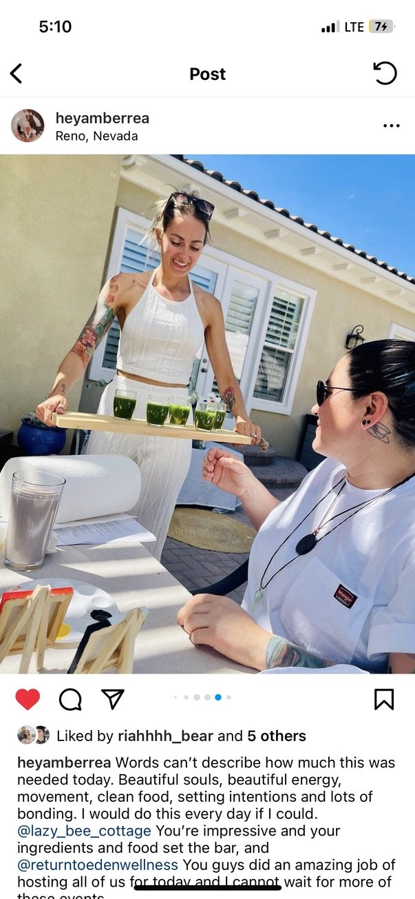 Outdoor wellness workshop in Nevada – participant serving green smoothies to fellow attendees at table, facilitated by ALIGN Agency