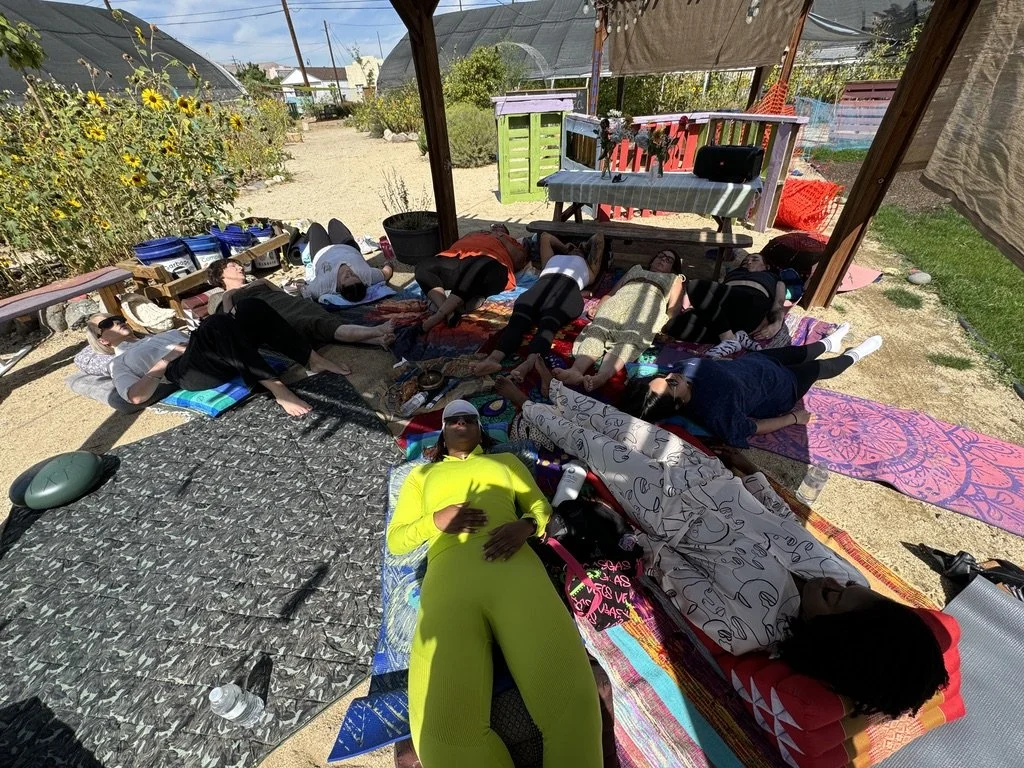 Group yoga session for organizations in Las Vegas – trauma-informed wellness program with outdoor retreat setting