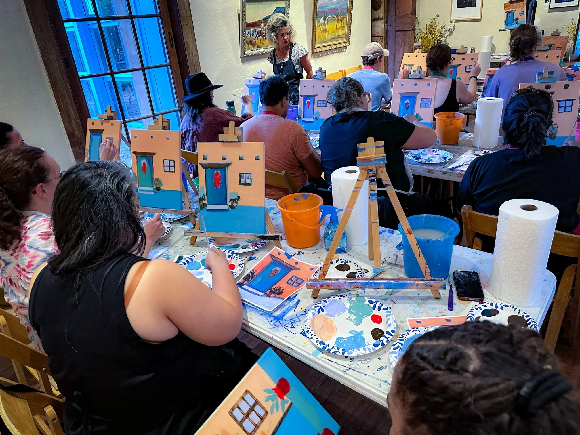 Creative wellness workshop for mission-driven organizations in Nevada – painting class facilitated by ALIGN Agency