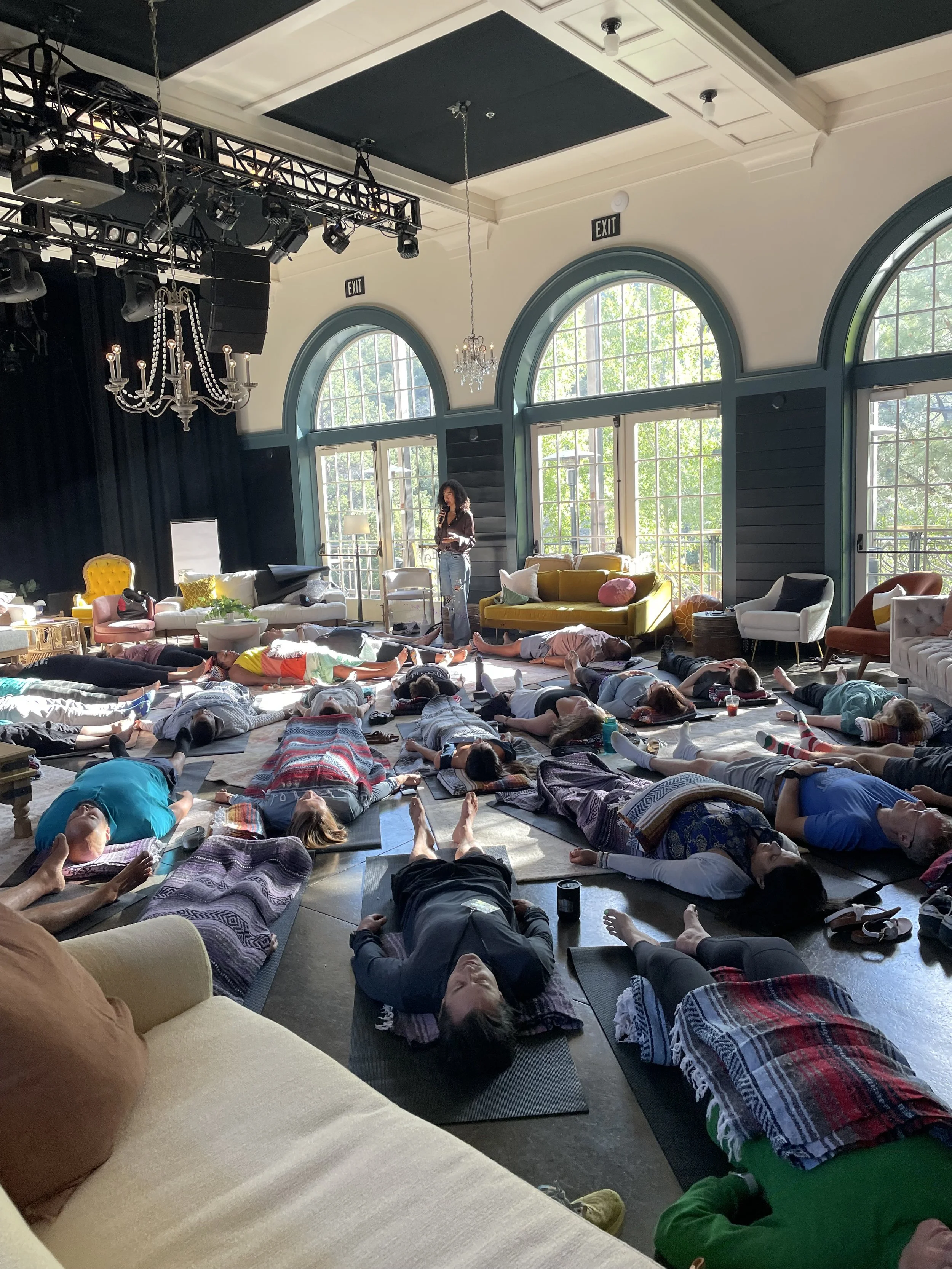 Indoor group yoga and meditation session for mission-driven organizations in Nevada – trauma-informed wellness program facilitated by ALIGN Agency