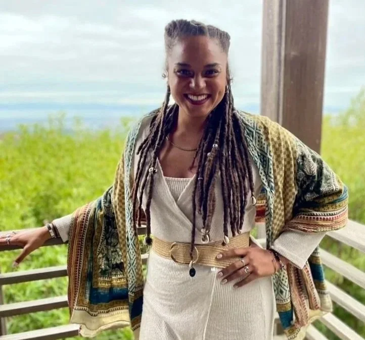 Founder of ALIGN Agency – women-led consulting and events agency in Nevada, standing outdoors on balcony in community-focused setting