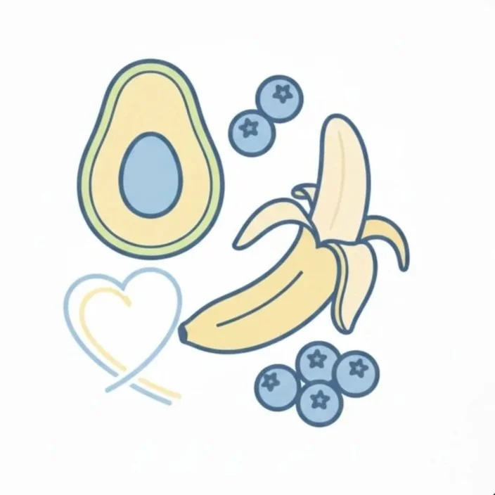 Illustration of a banana, half an avocado, blueberries, and a heart outline.
