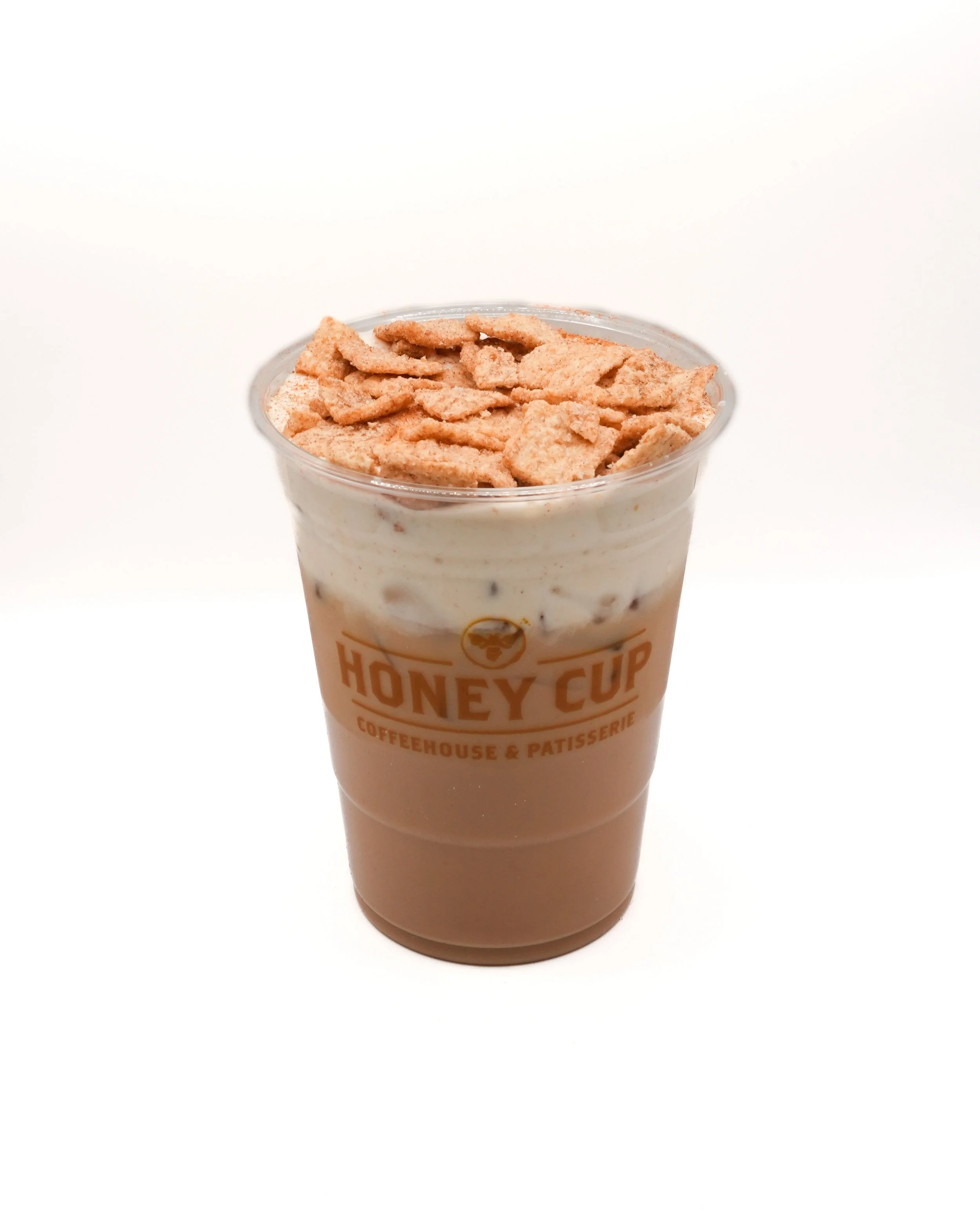 Cinnamon Toast Crunch Latte Honey Cup Coffeehouse Espresso swirled with a warm cinnamon flavor, finished with a sweet, nostalgic crunch