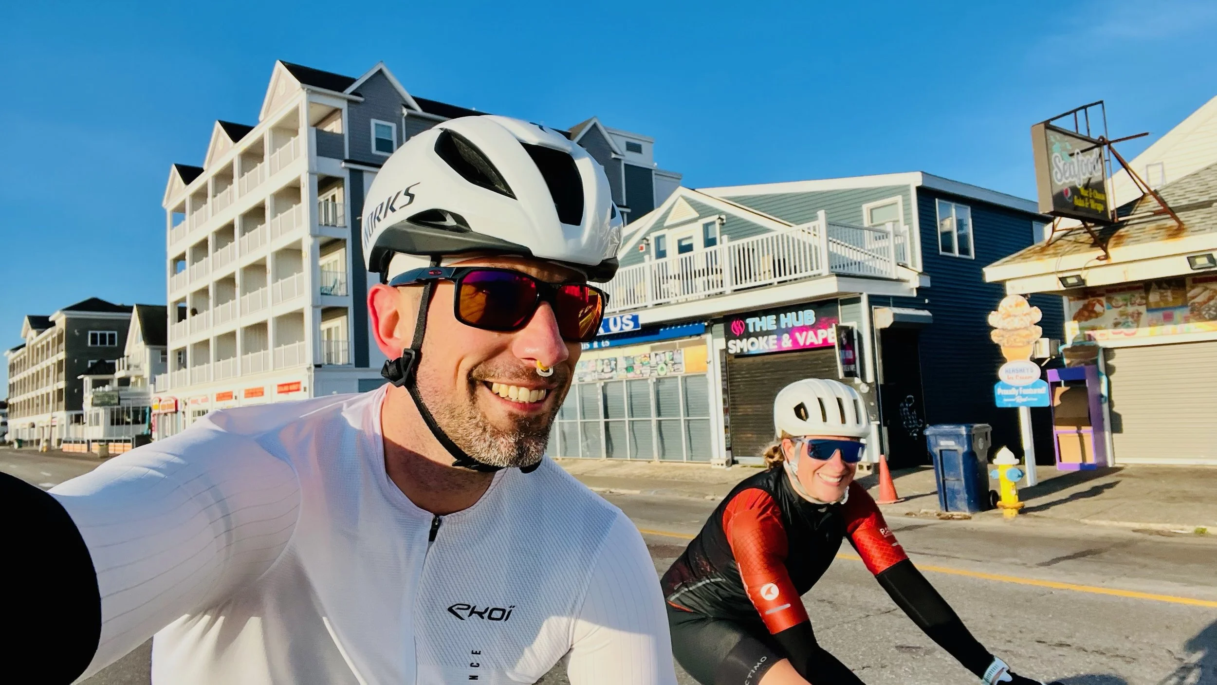 Annie and husband cycling the Seacoast Century in New Hampshire, 2025.