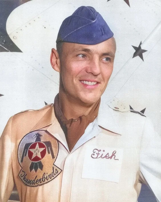 Colorized portrait of Thunderbird pilot Capt. Charles “Chuck” Salmon wearing a U.S. Air Force Thunderbirds flight suit with the name “Fish” on the chest.