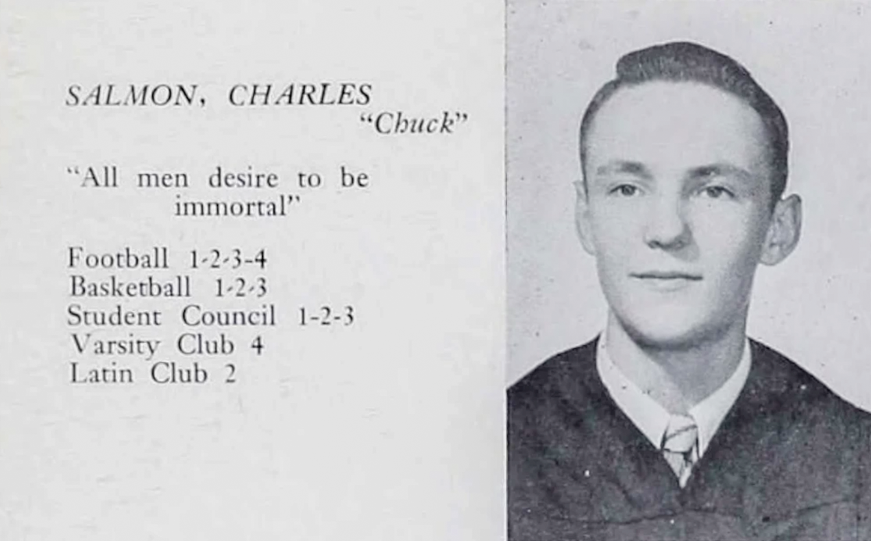 Black-and-white senior yearbook photo of Charles “Chuck” Salmon from Port Jervis High School, 1947. The page includes his activities and the quotation he chose: “All men desire to be immortal.”