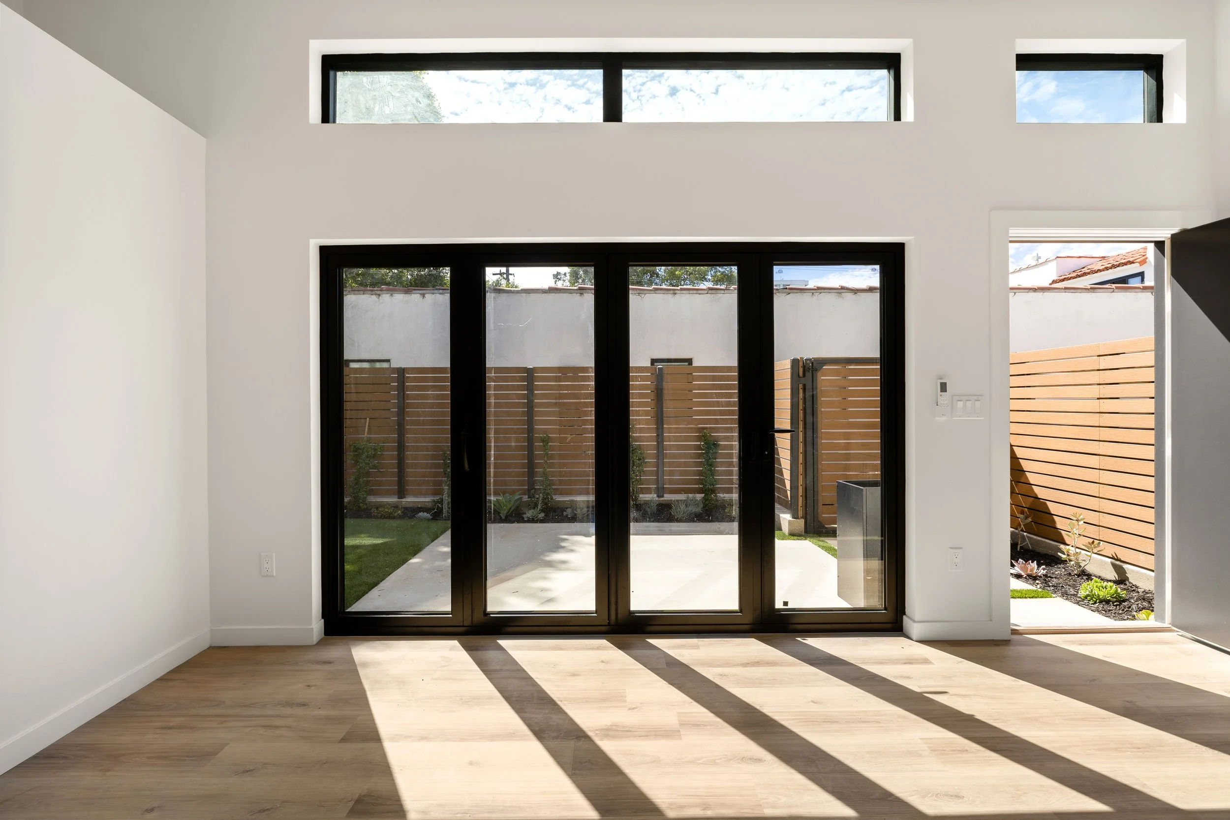 Contemporary housing development design with abundent natural light. Housing development services by Casitas Development