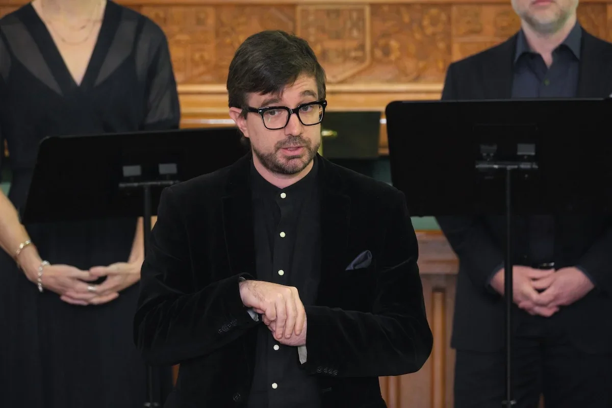 Man standing in front of choir