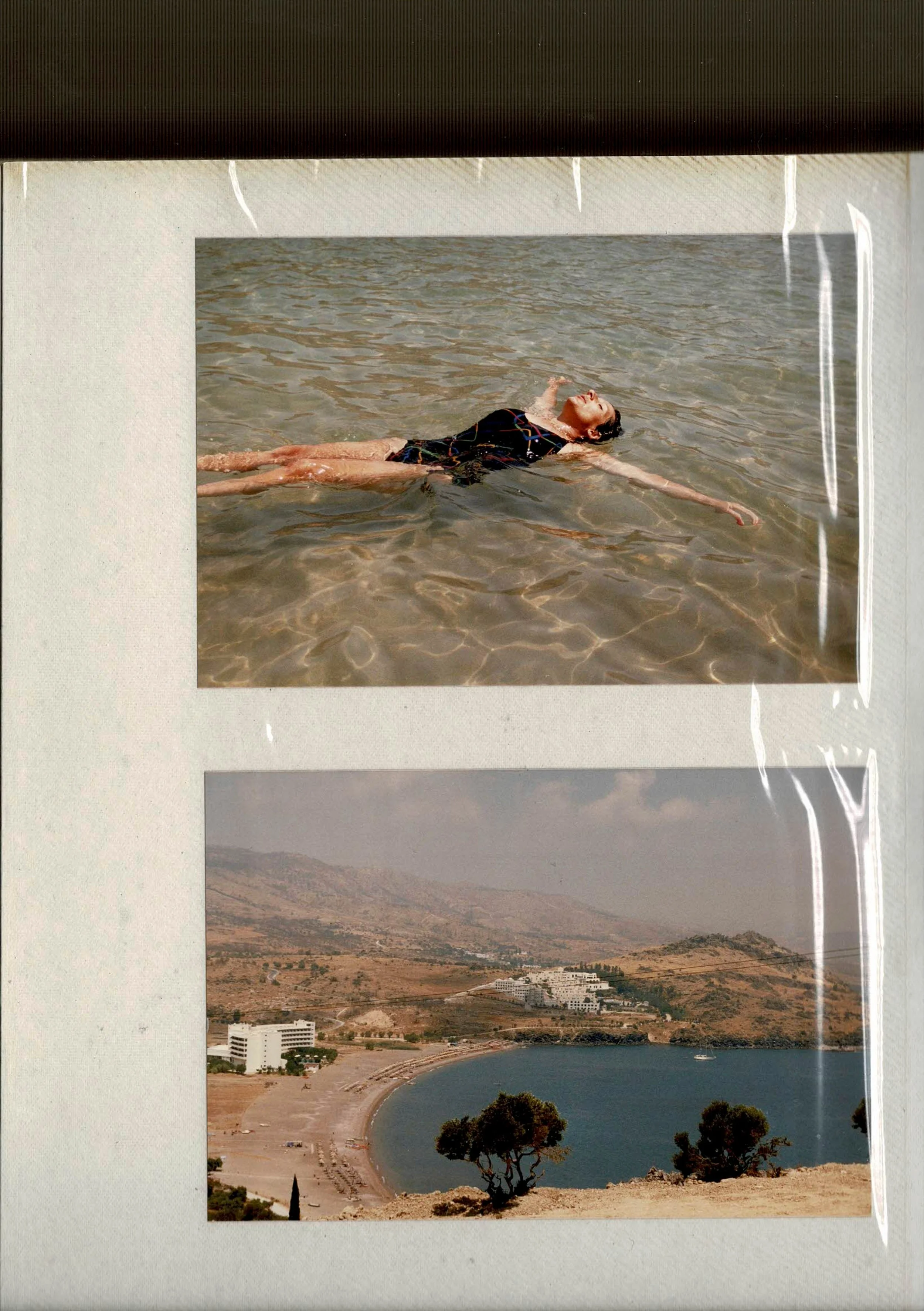 Photo album with two pictures featuring a woman swimming in greece
