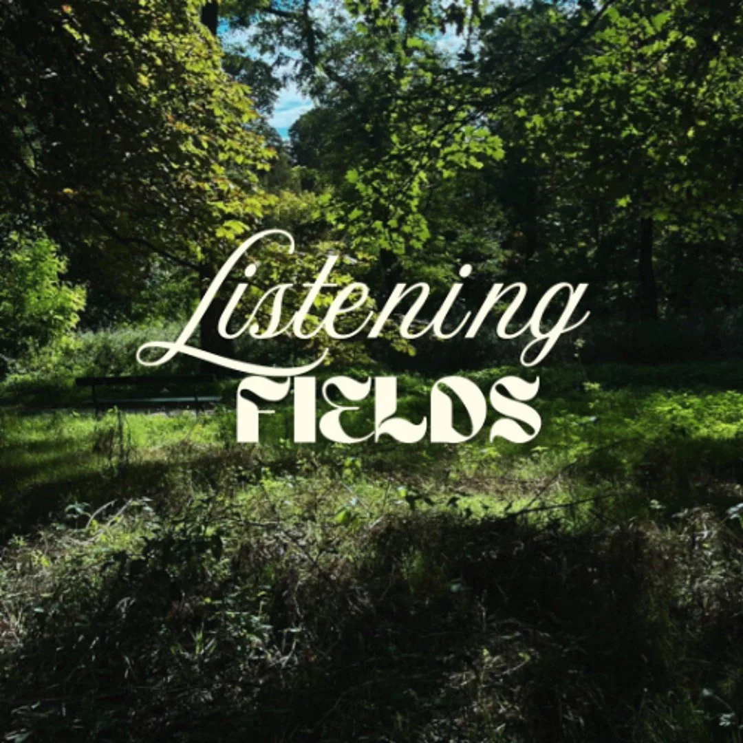 Calm meadow with white text