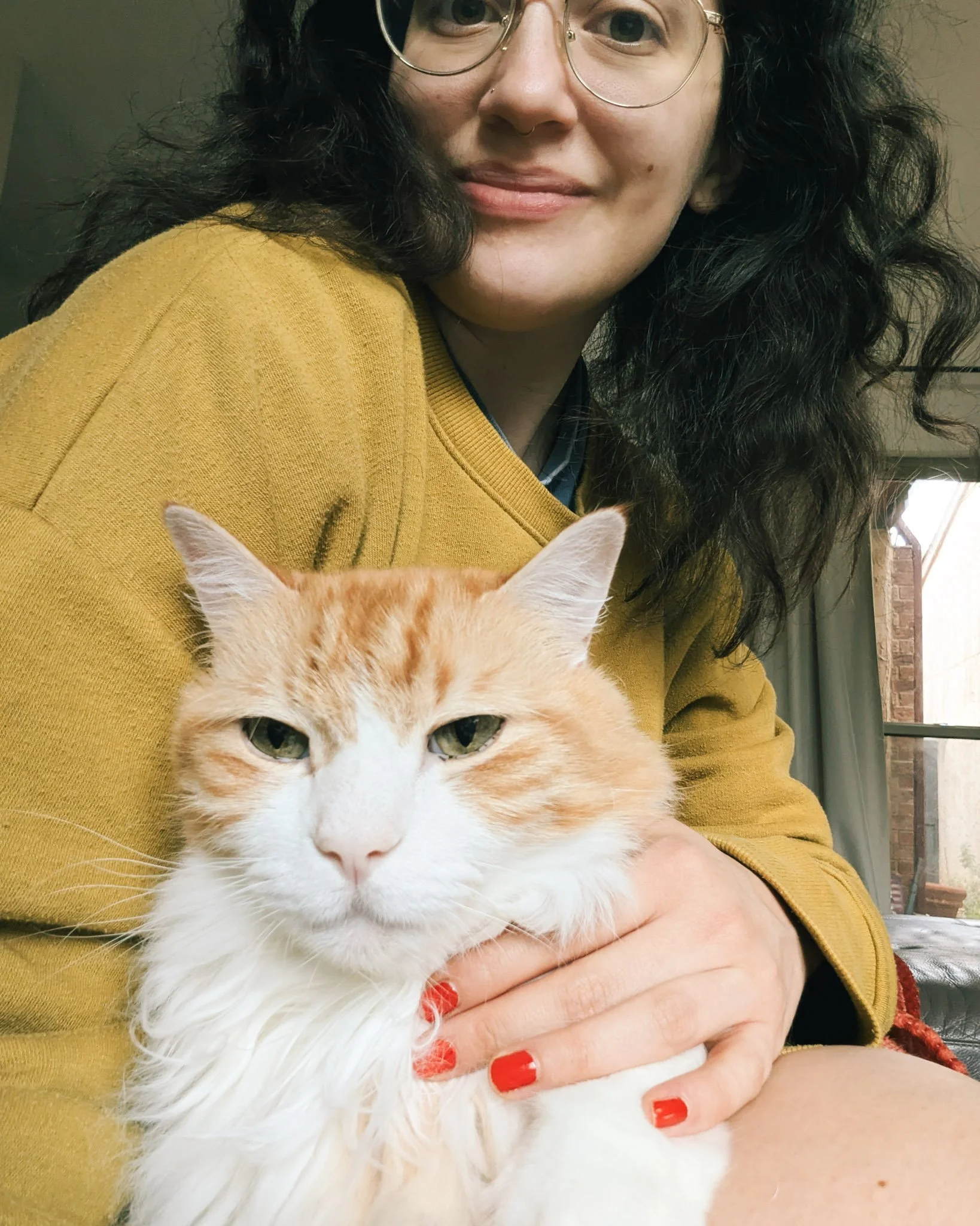 chelsea with one of her cats