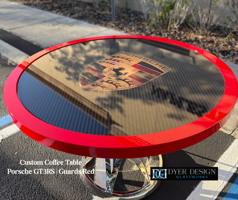 Porsche-inspired custom glass table for car collector garage