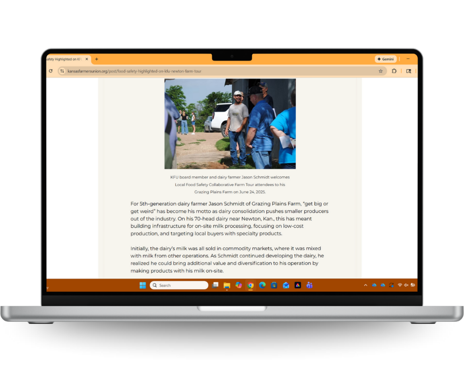 Laptop displaying a webpage about dairy farming, with a photo of people outdoors near a dairy farm.