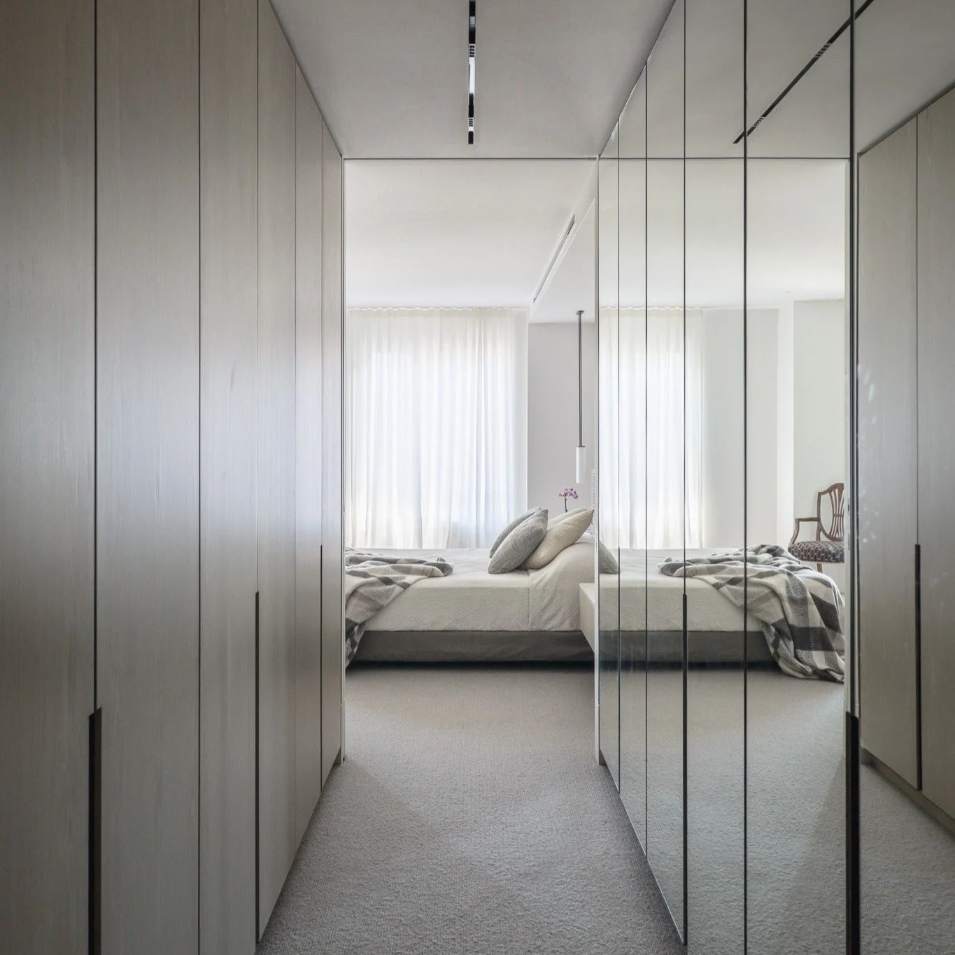 PROJECT II MACLEAY ST REVIVAL

Master Suite

The robe combines full height mirror doors on one side and veneer on the other. The mirrors bounce light through the space and make the room feel noticeably bigger. One of those simple moves that makes a b