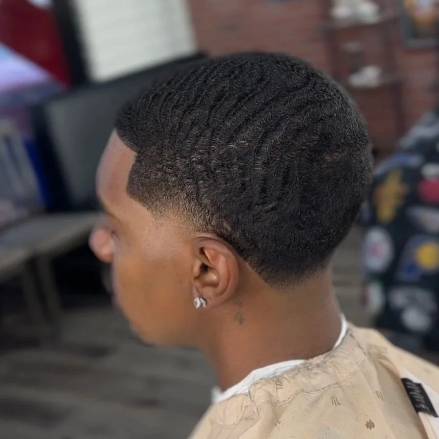 Clean fade haircut by Nate the Barber