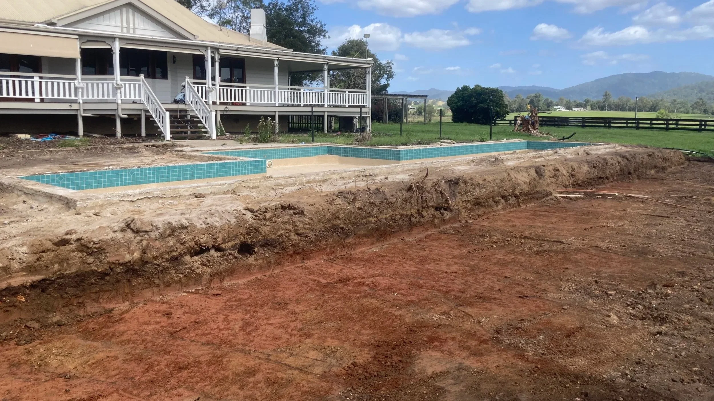 Oranssi technician working on a roof project