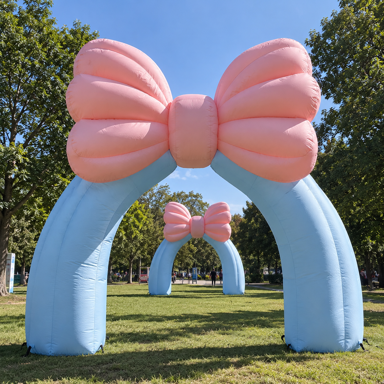 Pastel Bow Inflatable Archway in the Park.png
