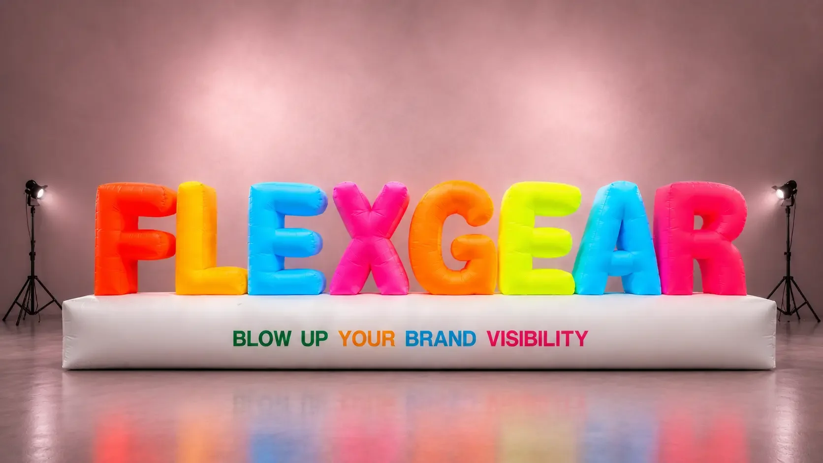 Custom 3D inflatable brand signage made of multicolor Oxford cloth featuring the text FLEXGEAR on a white inflatable base for event marketing and trade show displays.
