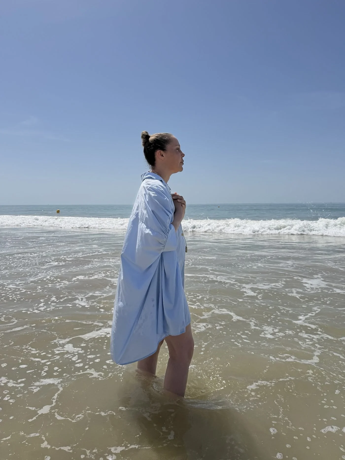 Nadège Rose on the shoreline, founder of The Loop and creator of The Loop method.
