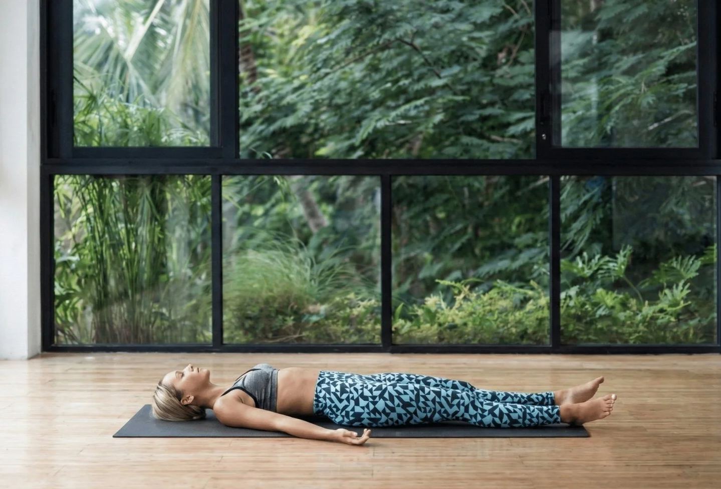 A woman practicing yoga nidra