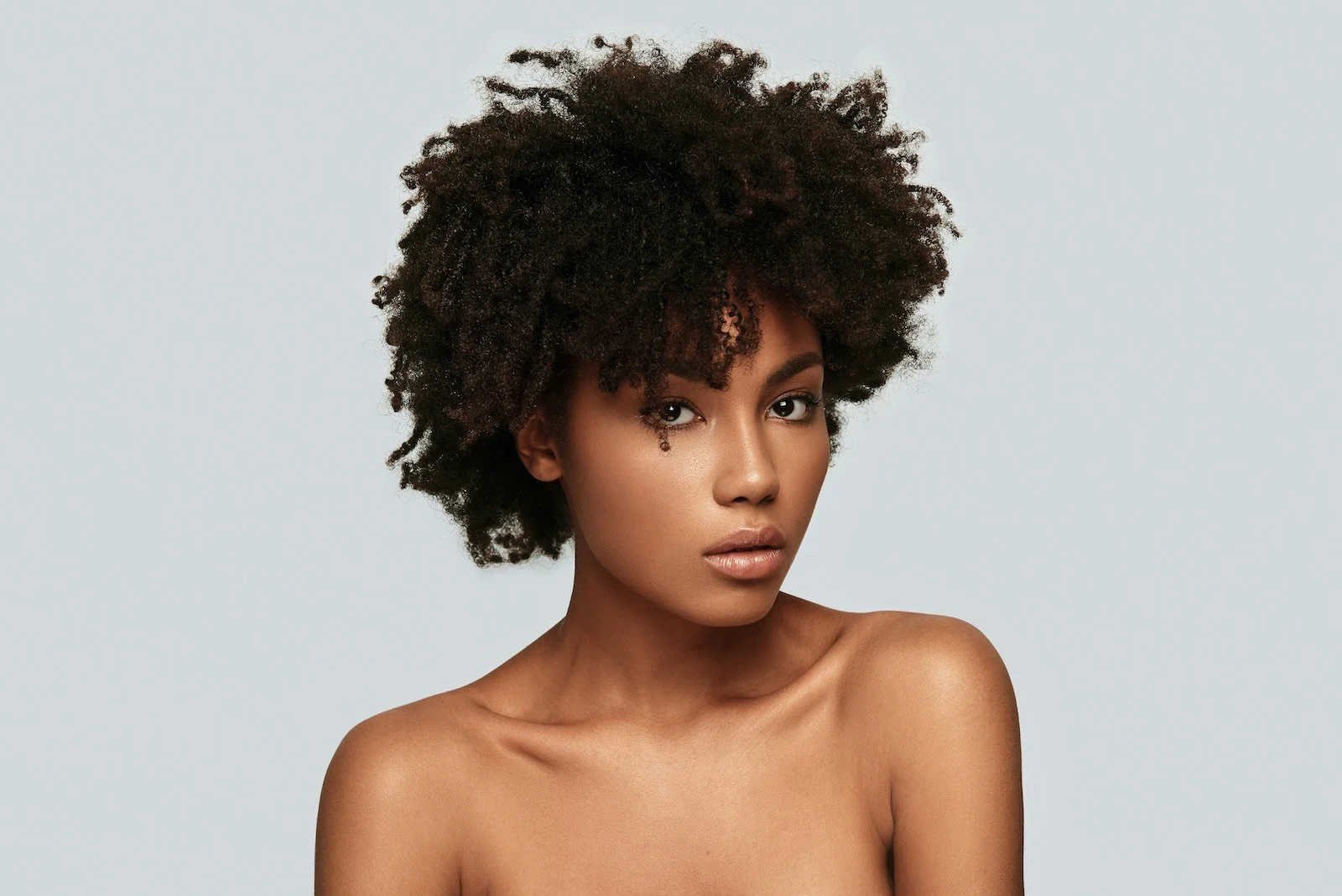 Natural curly hair with healthy definition and moisture, summer hair care NYC AlbertColor