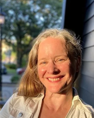 Karen Leta Gillespie, marriage & family therapist and art therapist at Resourced & Resilient, in a warm portrait photo. Click here for Karen Leta Gillespie's bio.