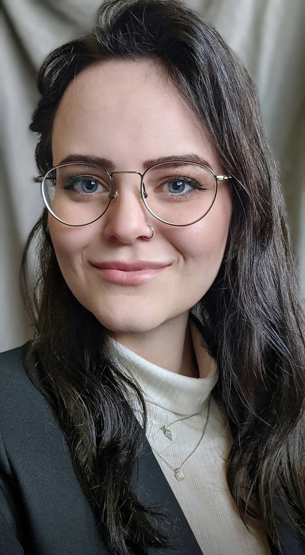 Amber Egdorf, individual adult & adolescent therapist at Resourced & Resilient, shown in a friendly professional photo. Click here for Amber Egdorf's bio.