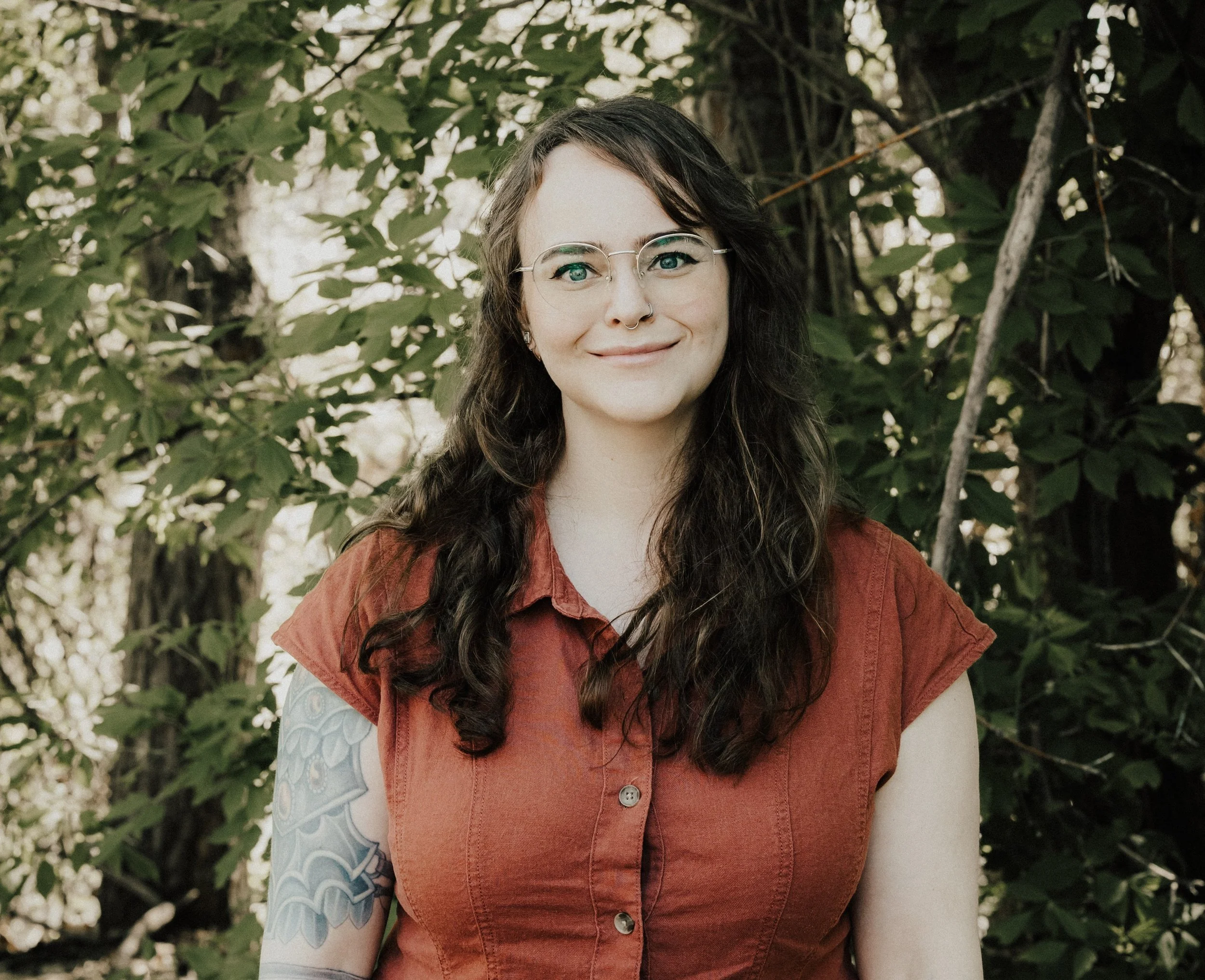 Amber Egdorf, individual adult & adolescent therapist at Resourced & Resilient, shown in a friendly professional photo. Click here for Amber Egdorf's bio.