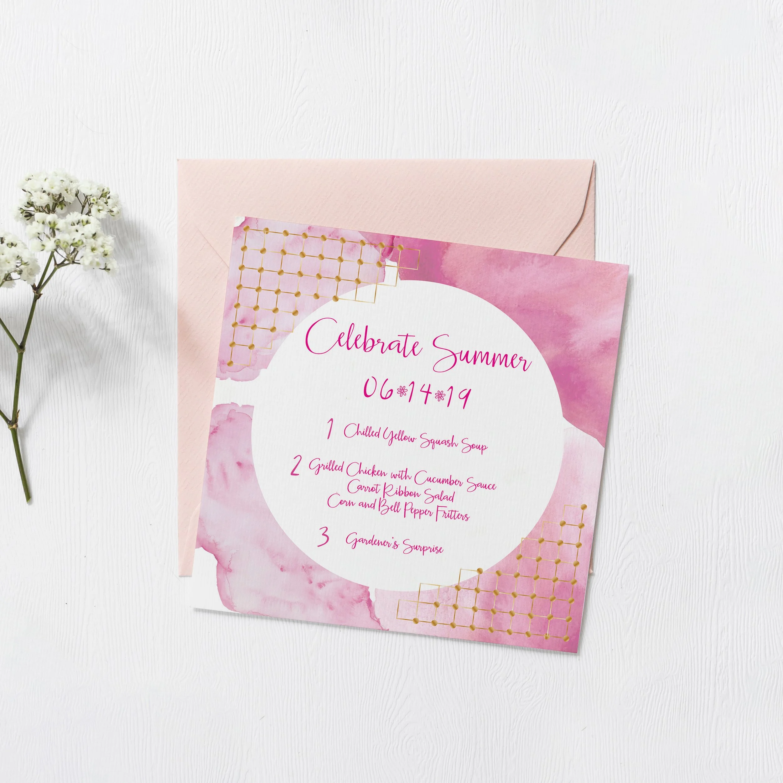 Wedding or celebration invitation card with pink watercolor design, gold geometric accents, and handwritten-style text listing a summer celebration event with date and menu.