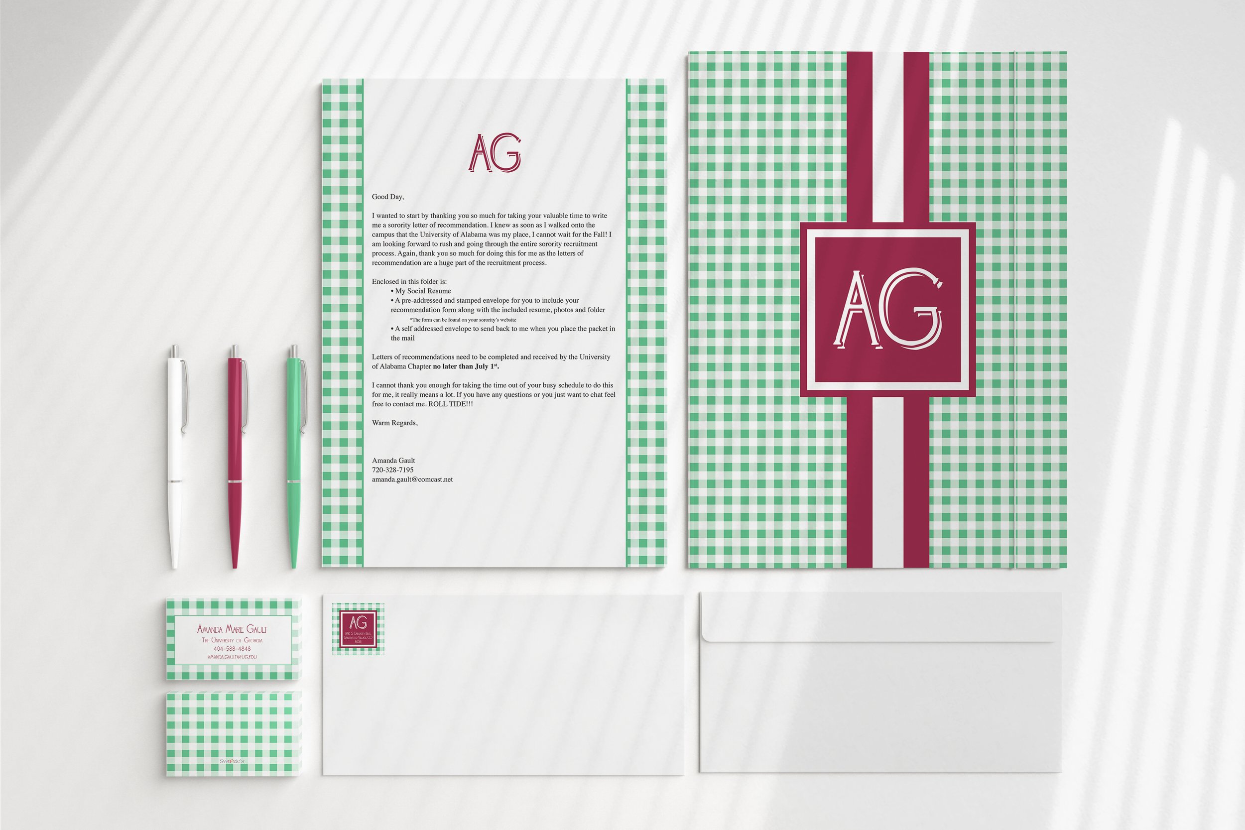 A set of college-themed stationery including a letter, envelope, business cards, pens, a folder, and a decorative banner with green and white checkered pattern, featuring the University of Alabama's colors and logo.