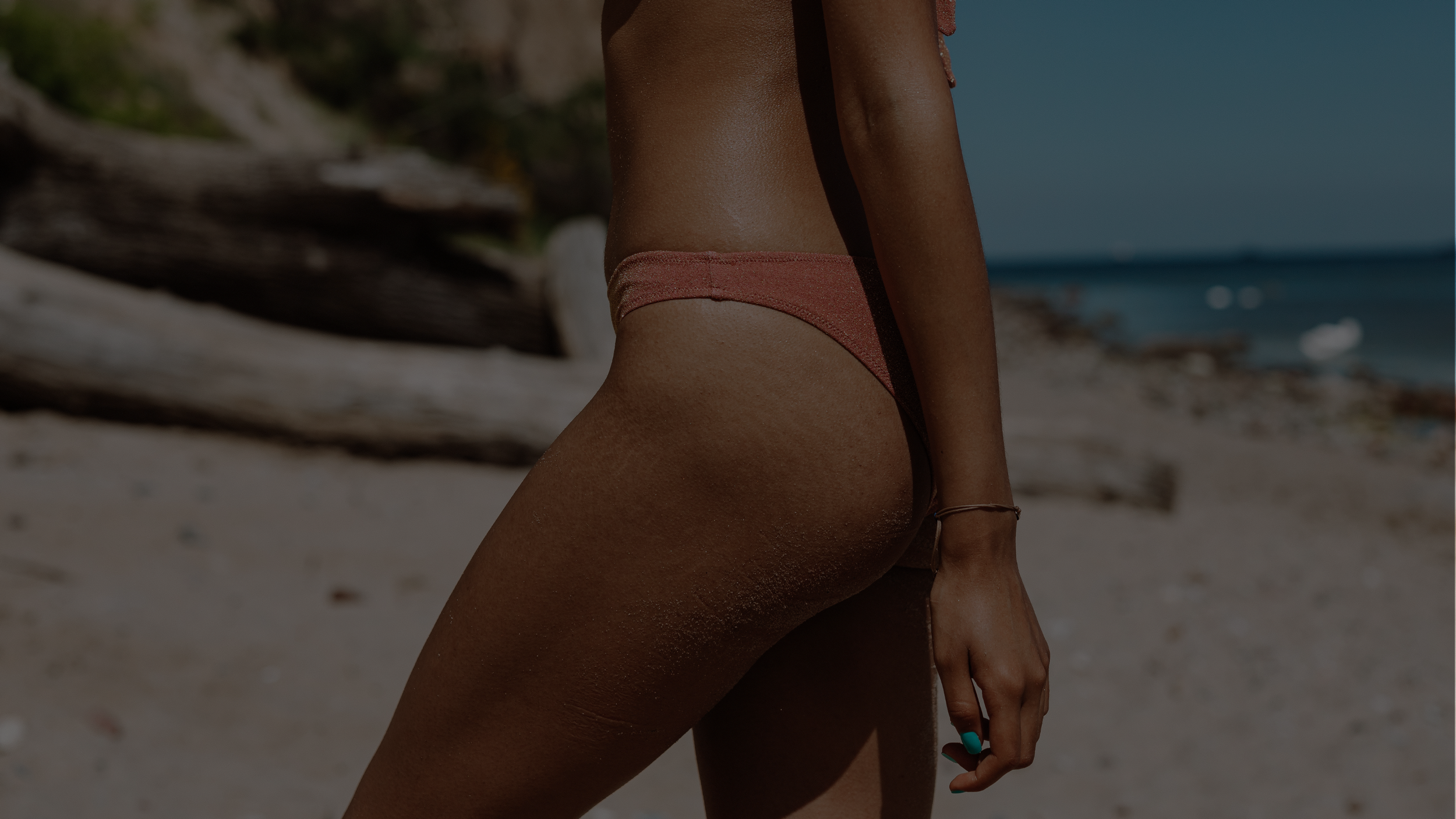 Close-up of a flawless, sun-kissed spray tan on client’s skin, Boise mobile service.