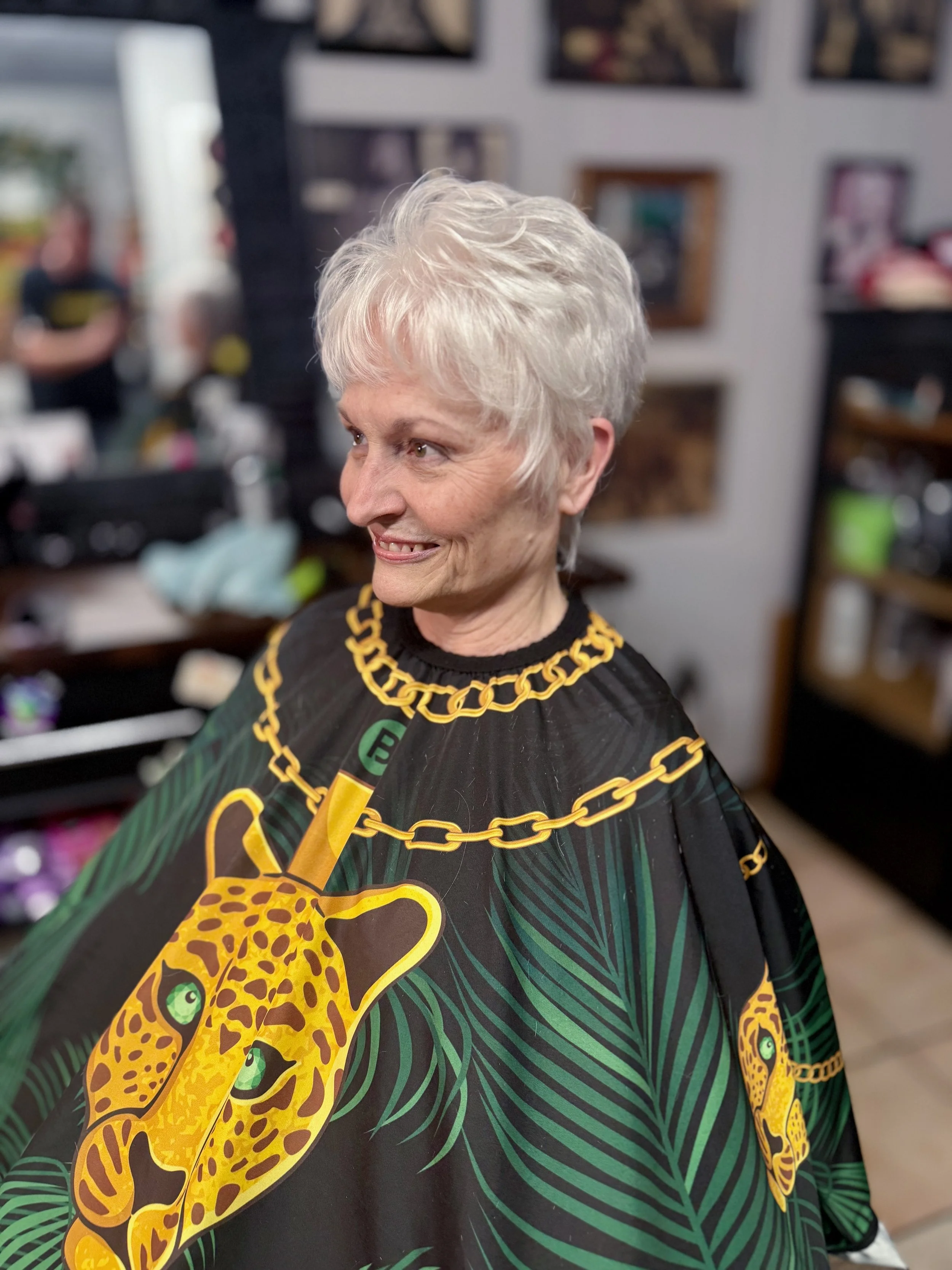 Senior woman with short wash and wear haircut at Snip Happens family salon in New Port Richey Florida
