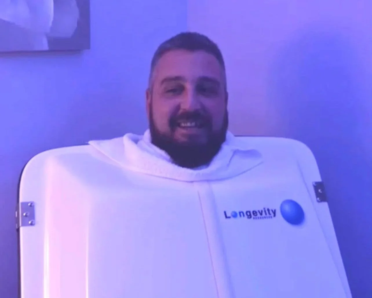 Snip Happens relaxing in an ozone sauna during a wellness session at L.A.L. Wellness Spa in Clearwater, Florida.