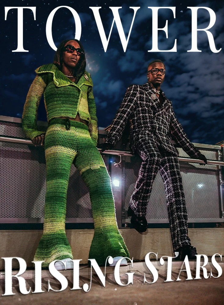 Two stylish individuals posing outdoors at night, with large white text reading 'TOWER' at the top and 'RISING STARS' at the bottom of the image.