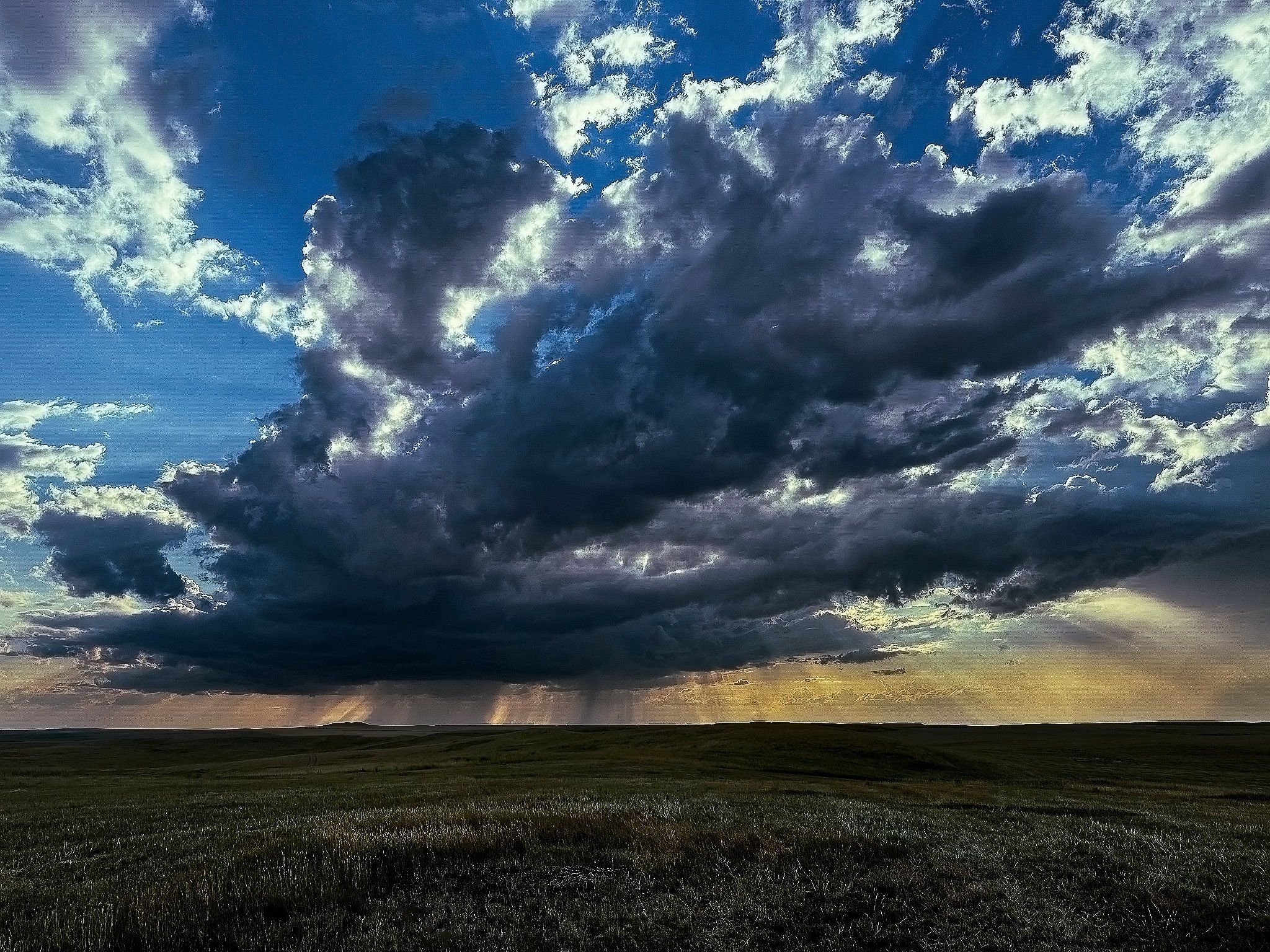 Golden Sun Rays passing through a Summer Storm