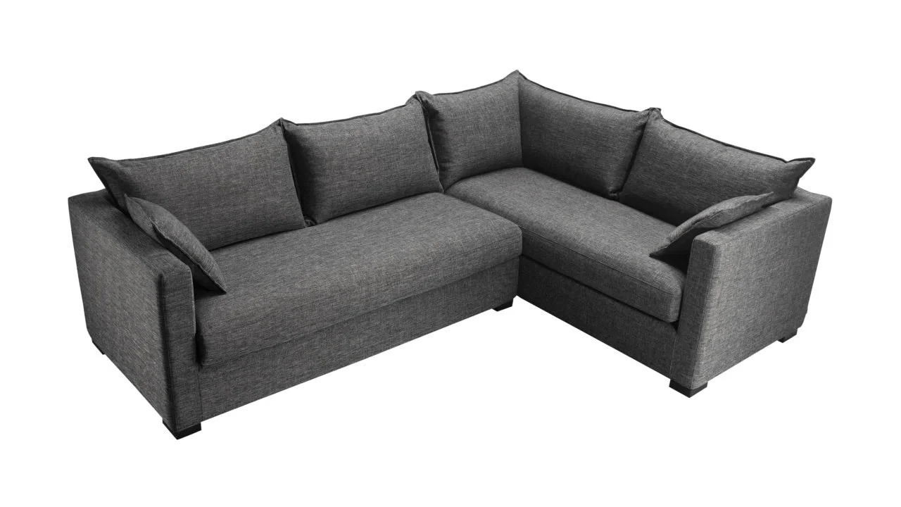Canapé d'angle gris avec coussins